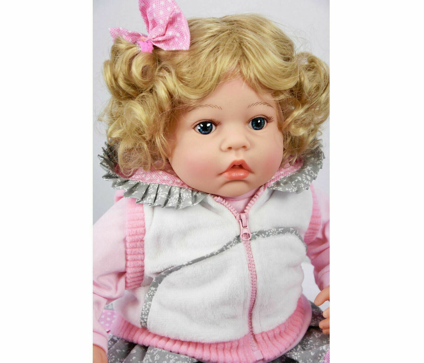 Baby Toddler Sitting Baby Doll with a white coat