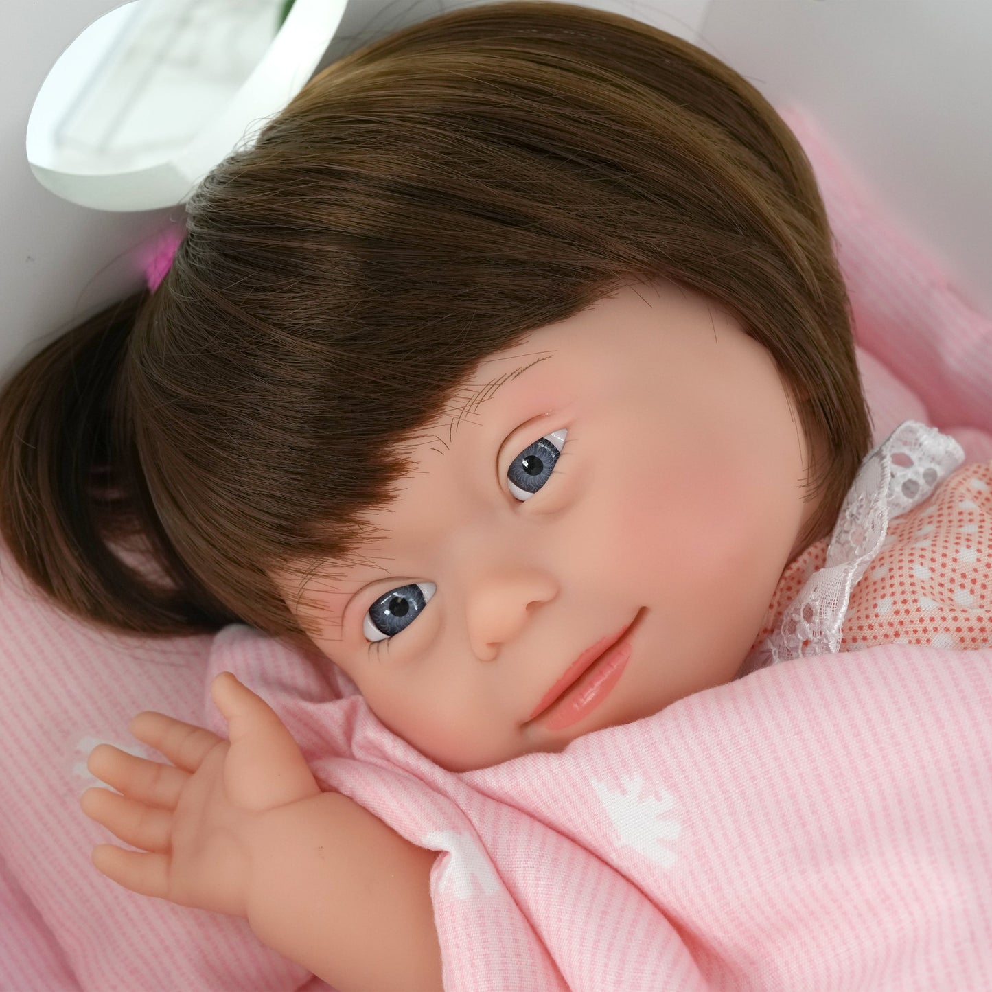 Brown Hair Girl Baby Doll with Down Syndrome